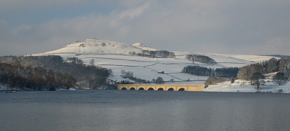 The snow capped, twin peaks of Crooke Hill near Ladybower Reservoir.